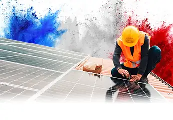 Installer mounts solar panel on tiled roof, with French flag in the background